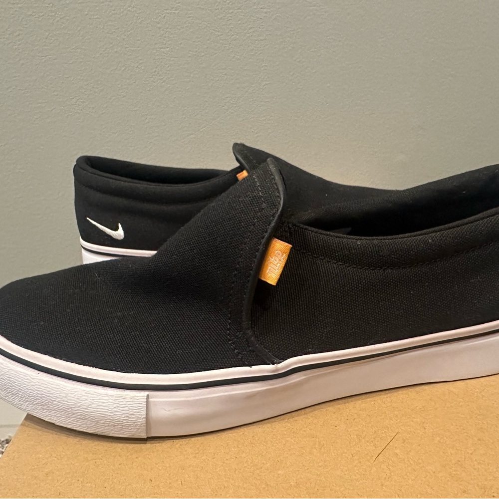 Nike Black Canvas Slip-Ons with White Sole